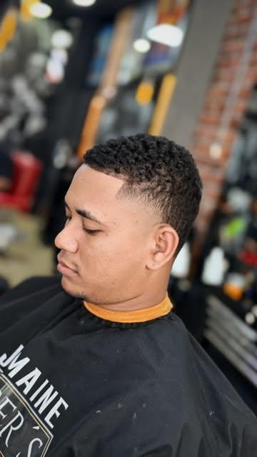 Taper fade en Jermaine Barber's